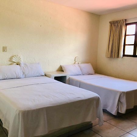 Hotel Playa Del Parque By Rotamundos Huatulco Esterno foto